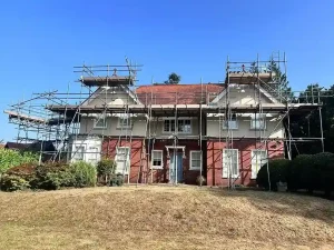 Commercial scaffolding on a building site in Birmingham with exterior renovation work in progress