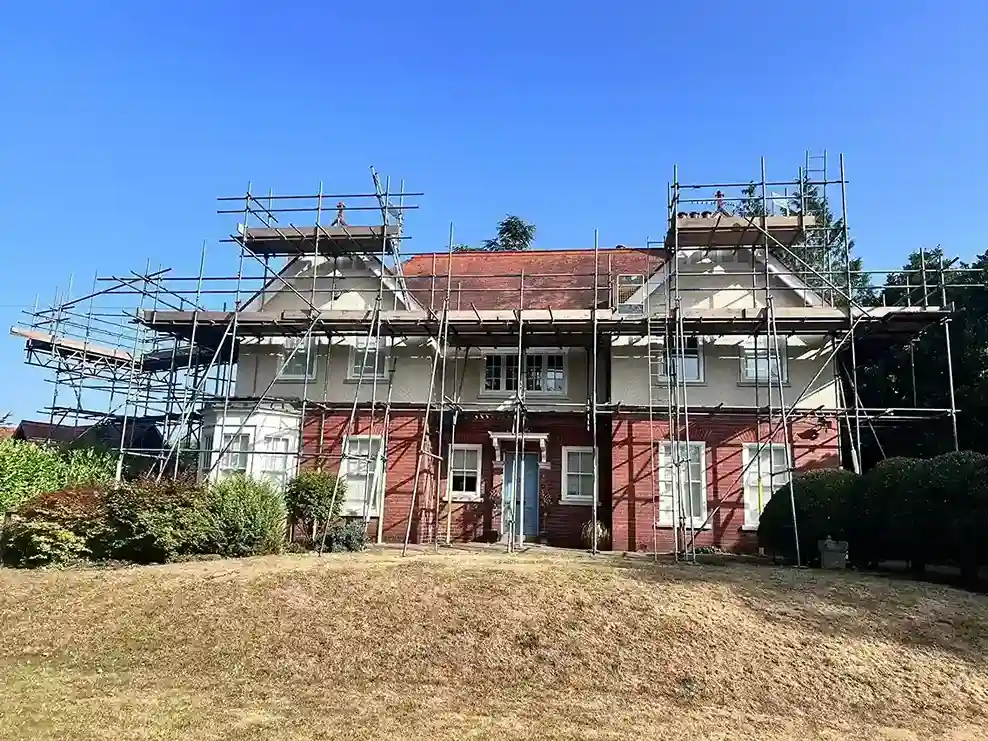 Commercial scaffolding on a building site in Birmingham with exterior renovation work in progress